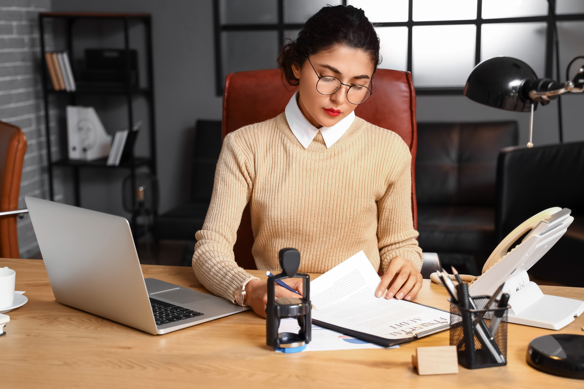 Female Notary Public Working in Office